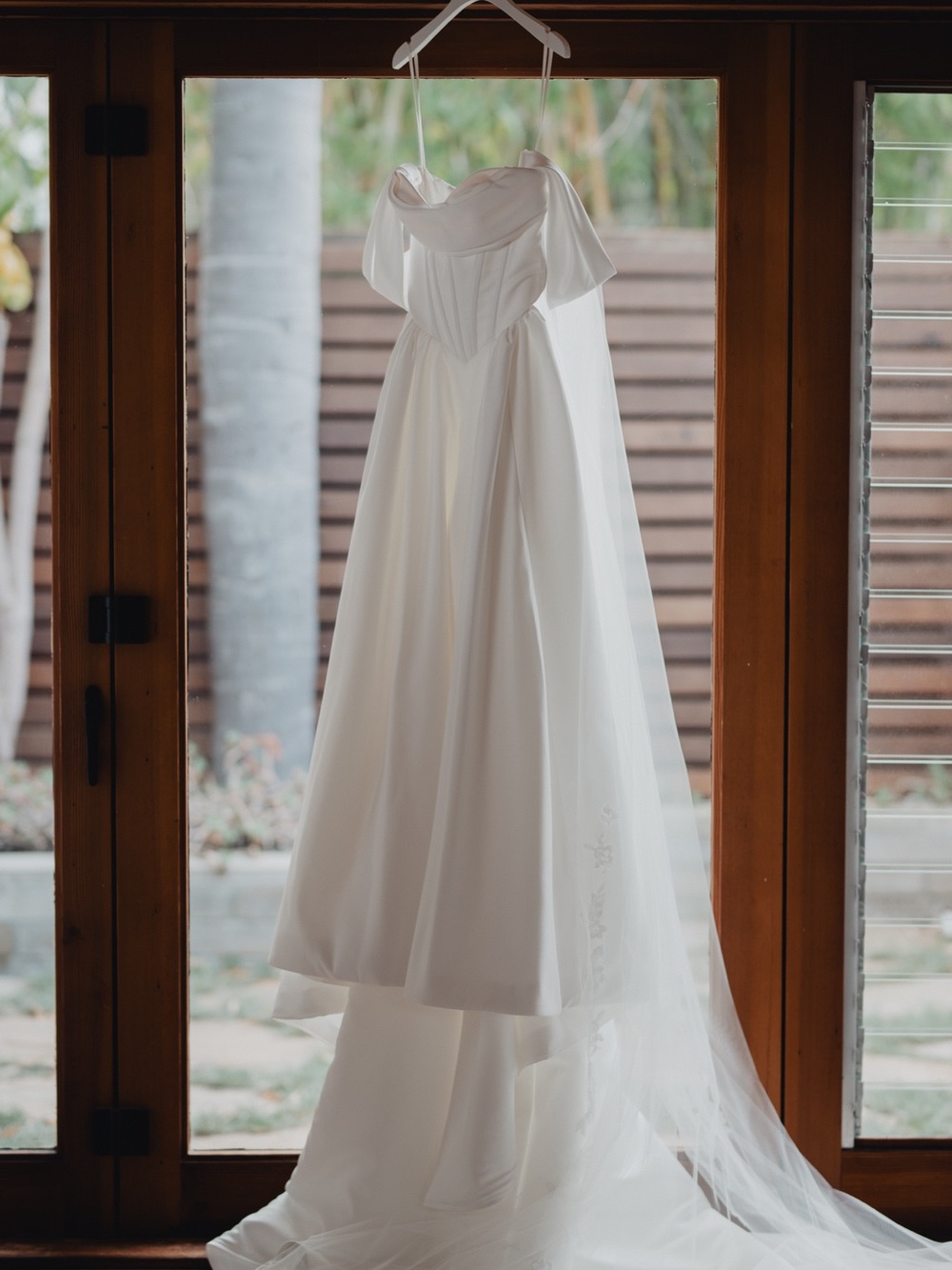 Elegant White Bridal Gown with Off-Shoulder Detail